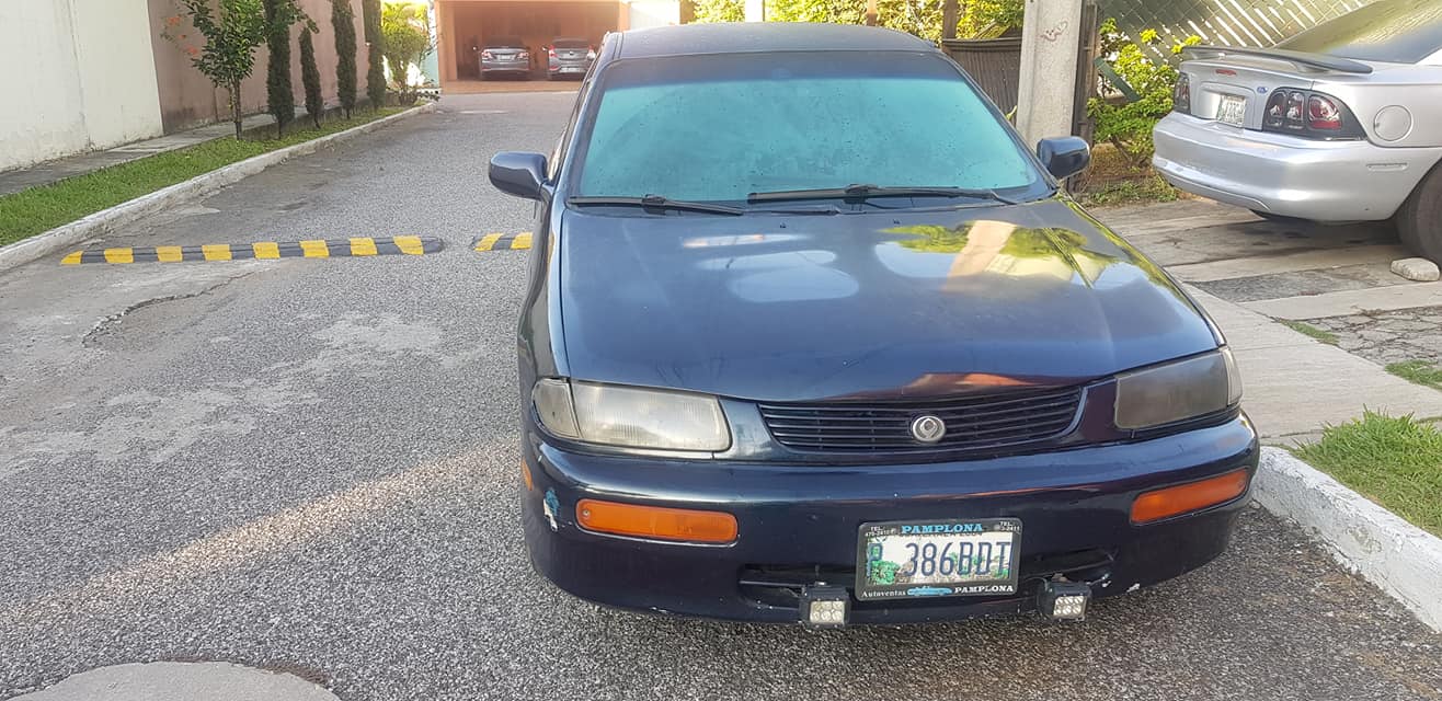Vendo mazda protege 1996 automatico full equipo bolsas buenas radio cd  a toda prueba 14000 cash