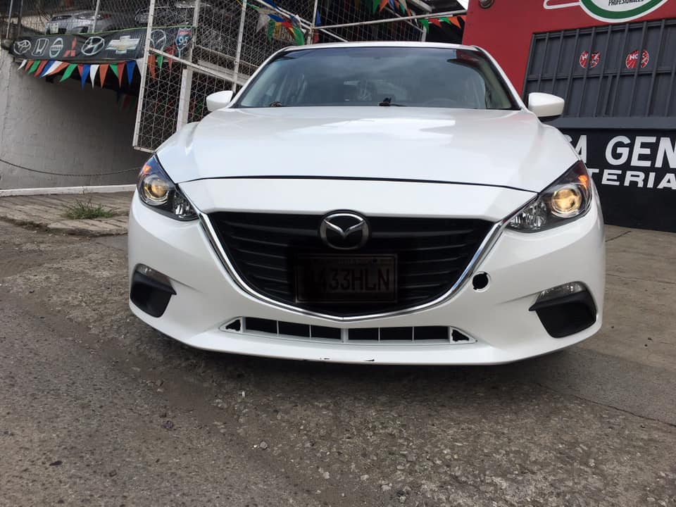 VENDÓ MAZDA 3 HASHBACK 2014