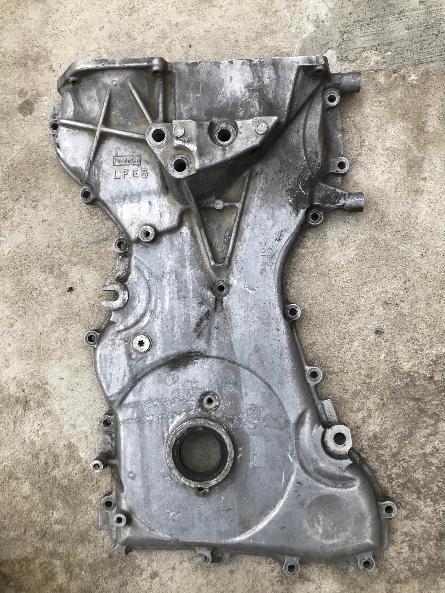 Tapa frontal motor mazda 3