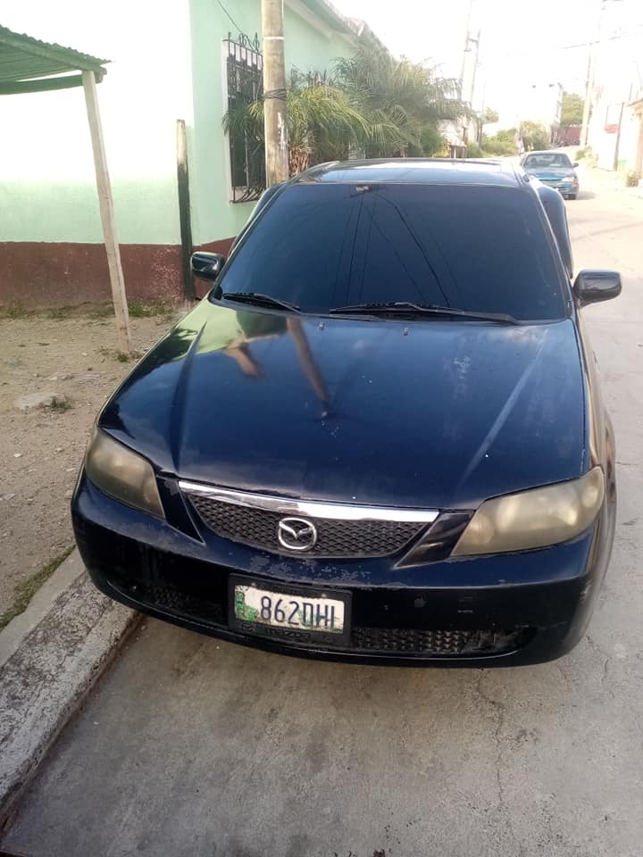 Vendo 9 cambio mazda protege 2003 autonatico 4 puertas ajustadod motor caja al 100 lerr bien todo