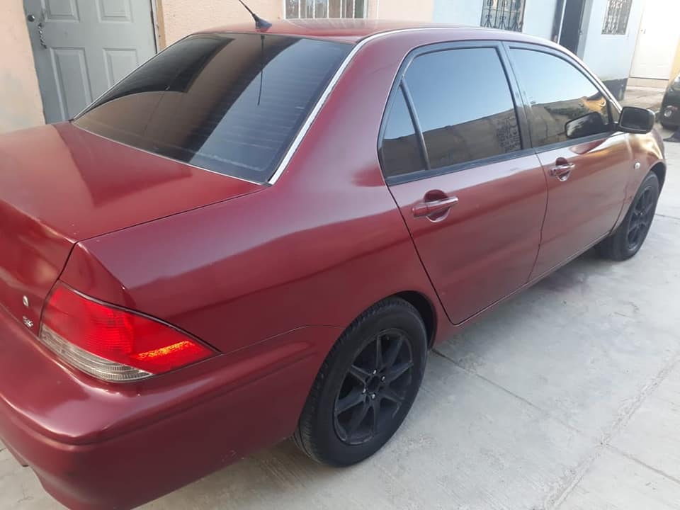 Lancer 2002 automático
