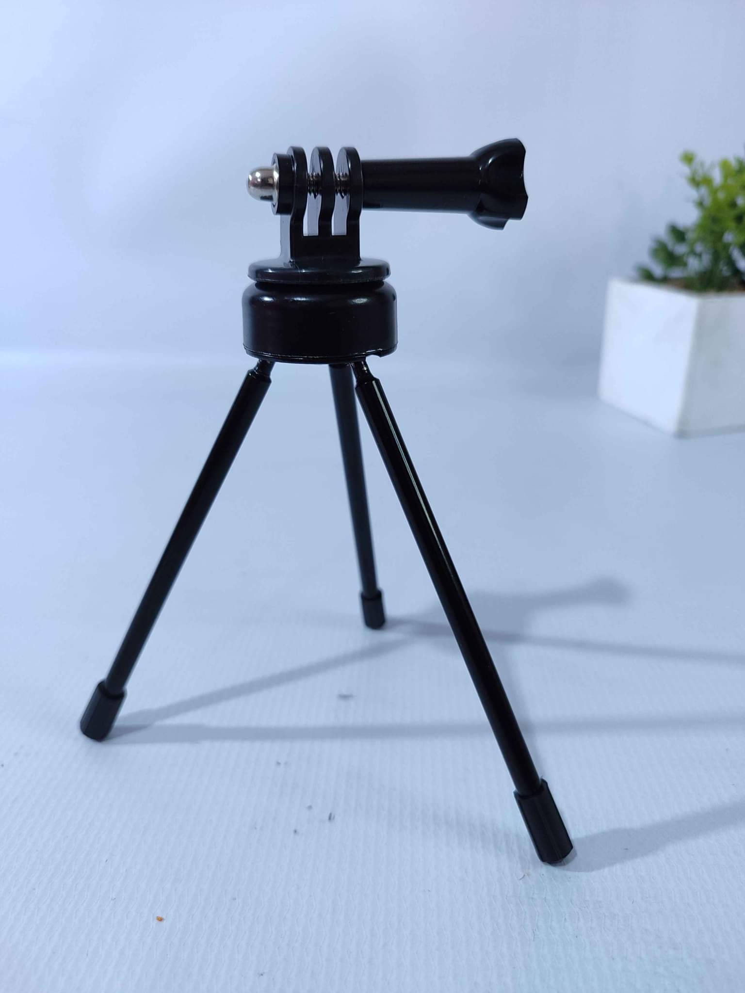 Adaptador o soporte para montar cámaras de acción tipo GoPro a variedad de trípo
