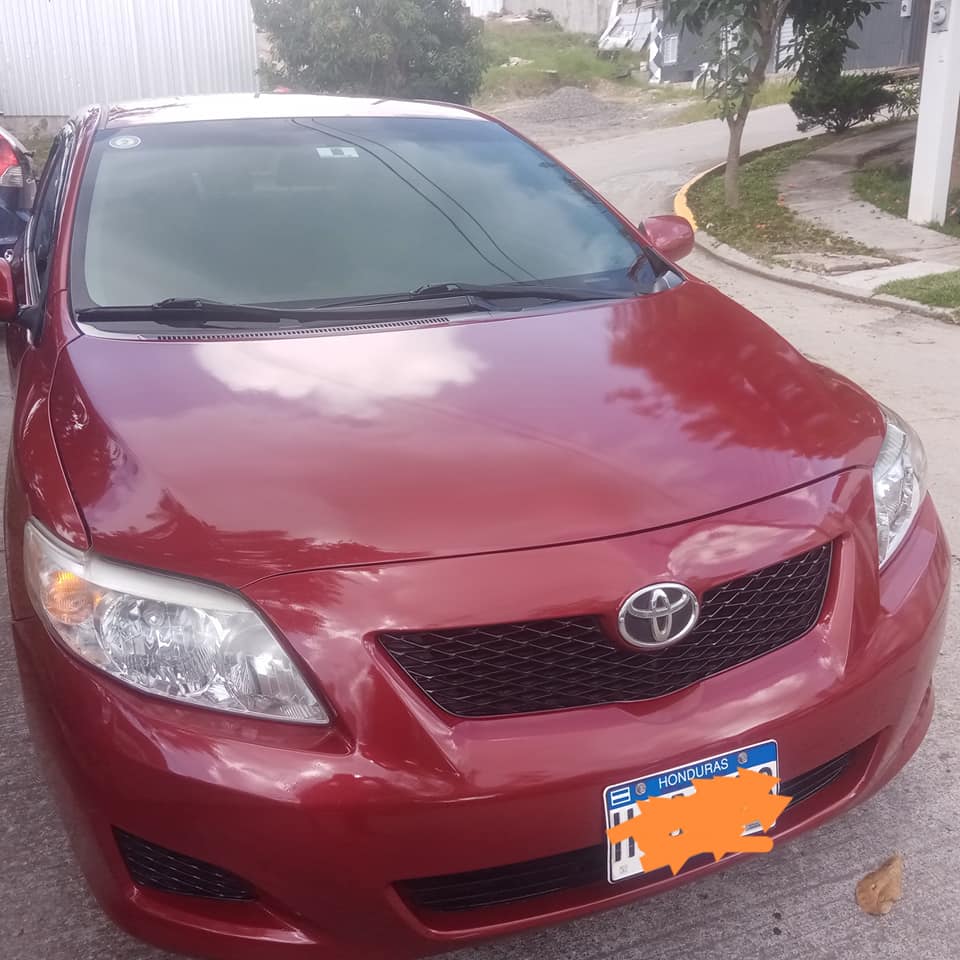 Corrolla 2010 nítida motor 1.8 asientos de tela vidrios eléctricos llantas en bu